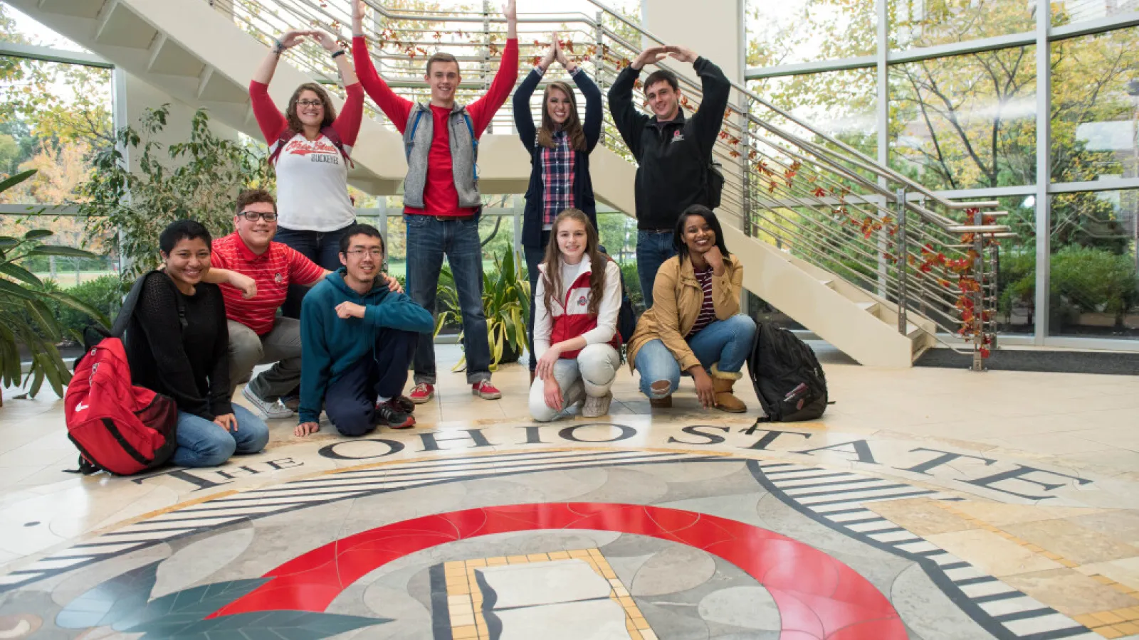 Students spelling Ohio with their arms