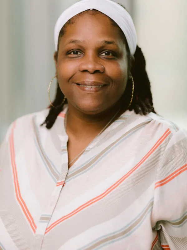 Headshot of Chevon Toler with neutral background