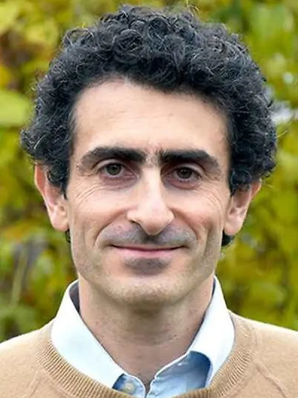 Guido Festuccia with blurred trees in the background