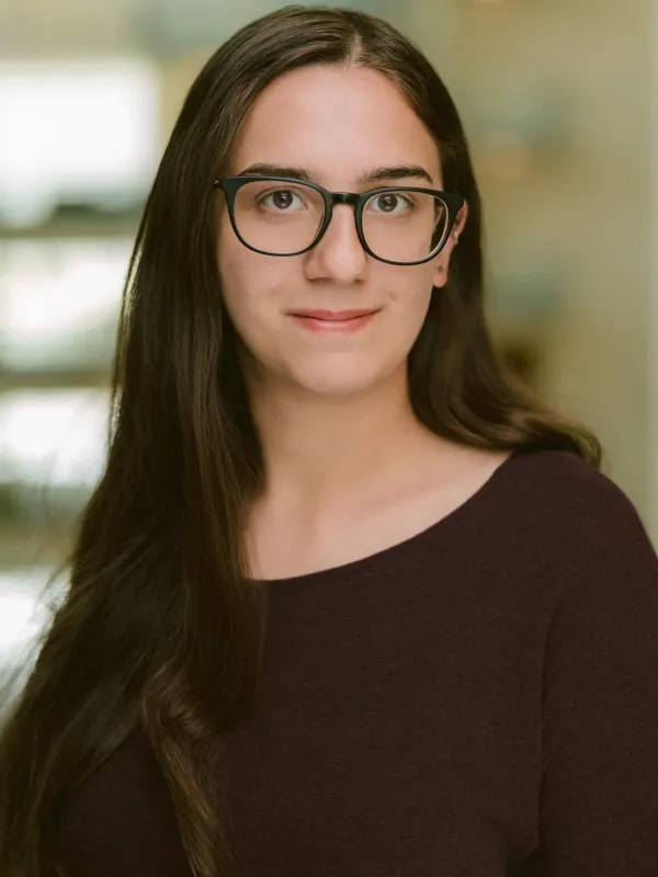 professional headshot in the physics research building