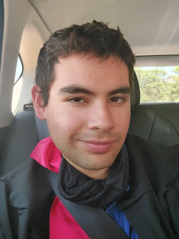 Personal headshot following undergraduate college graduation ceremony.